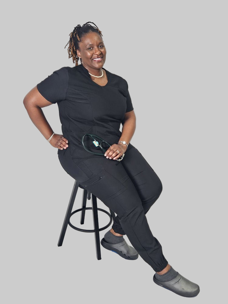 Side angle showing flattering curvy fit and low-flare jogger silhouette.