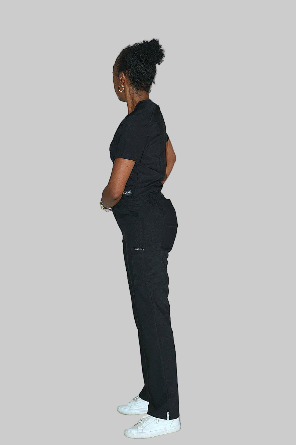 Side view of Valmasi Jasmine Cargo Scrub Pants showing curvy fit and functional cargo pockets.
